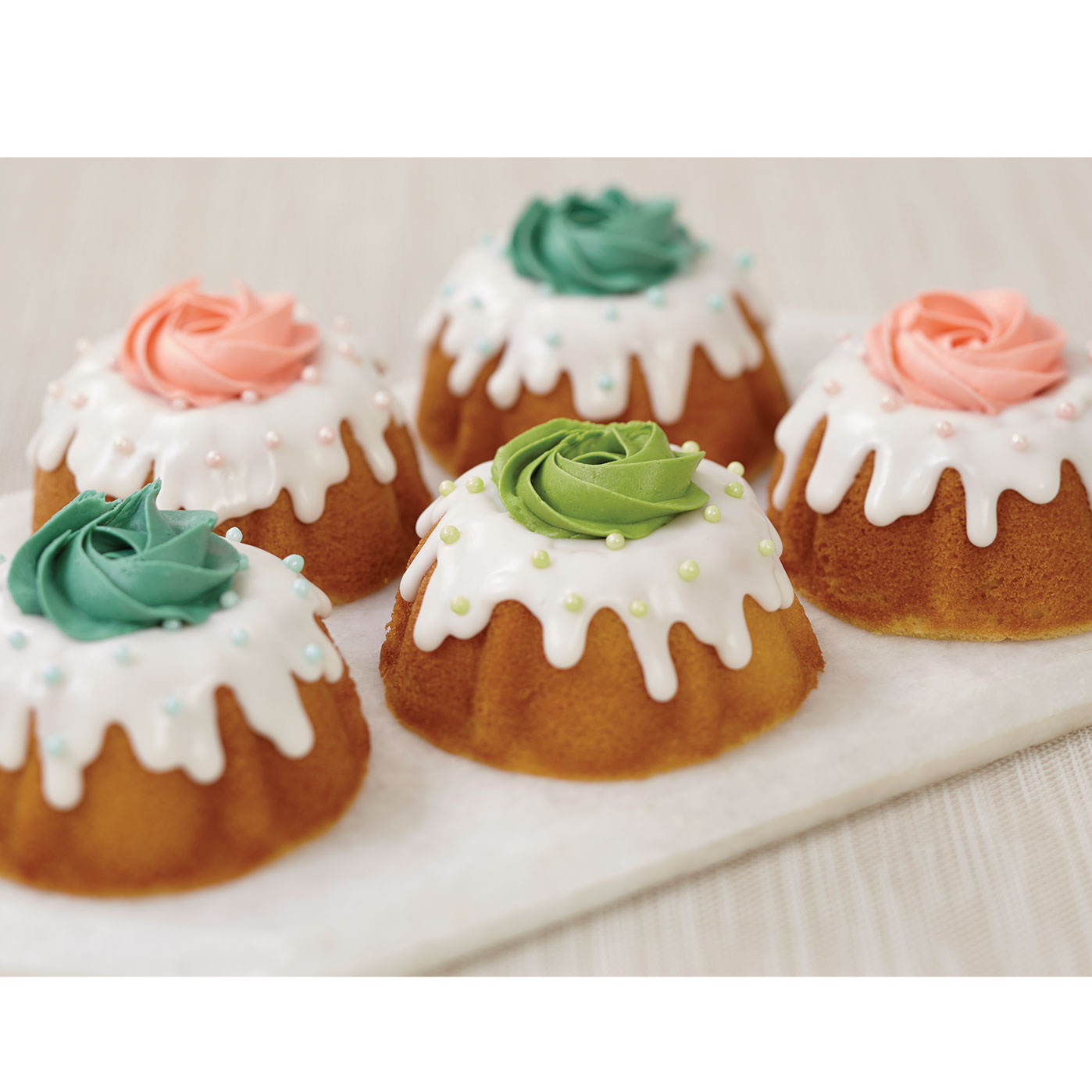 Rosette Topped Mini Fluted Cakes