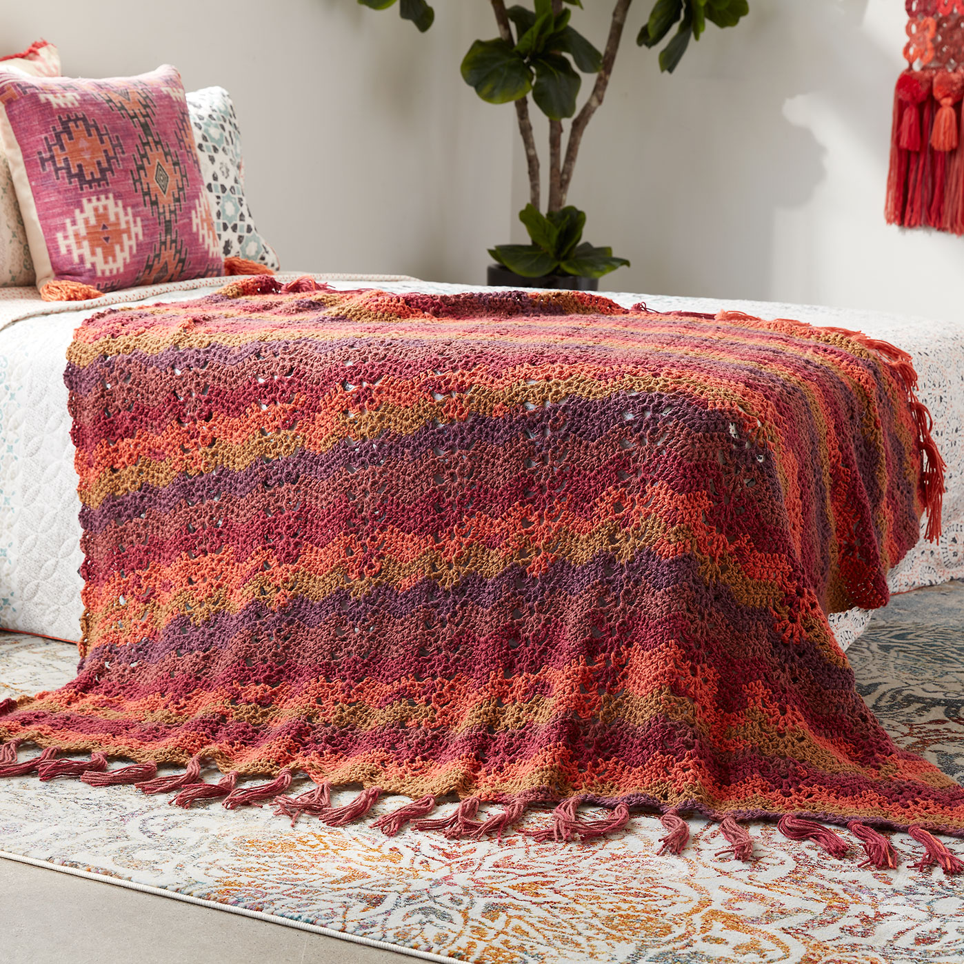 Caron® Big Cakes™ Ocean Waves Crochet Blanket in Cranberry Crisp